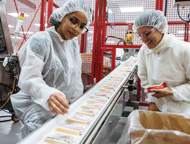 Team members pack Plumpy’Nut at Edesia