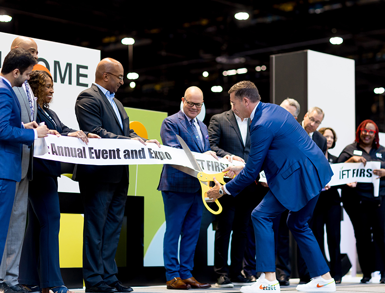 2023-2024 IFT President Sean Leighton cuts the ribbon to open the IFT FIRST Expo