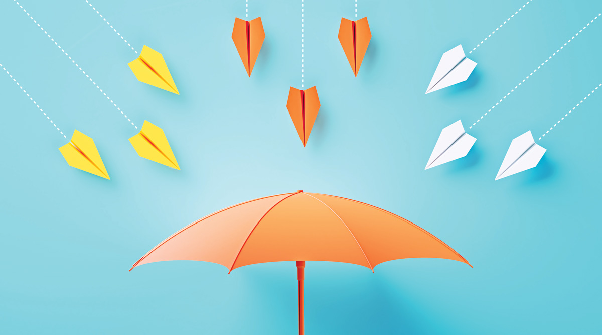 Paper Planes Flying Towards A Coral Colored Umbrella