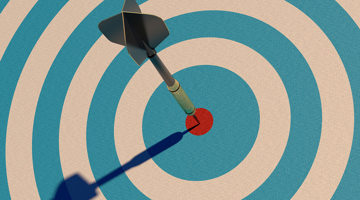 A dart on a bullseye.